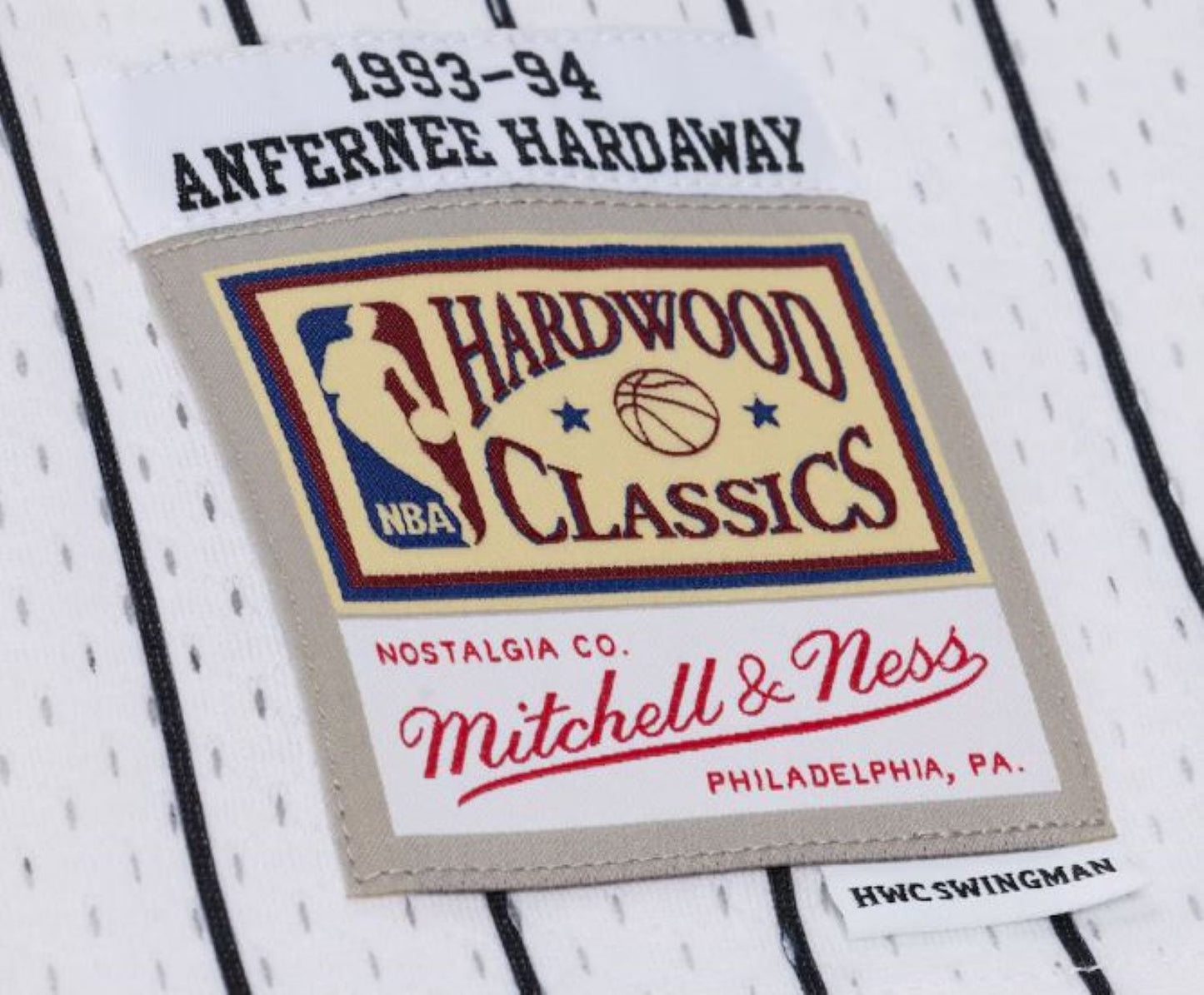 Mitchell & Ness NBA Anfernee Hardaway Orlando Magic 1993-94 Swingman Player Jersey - White/Black Pinstripe