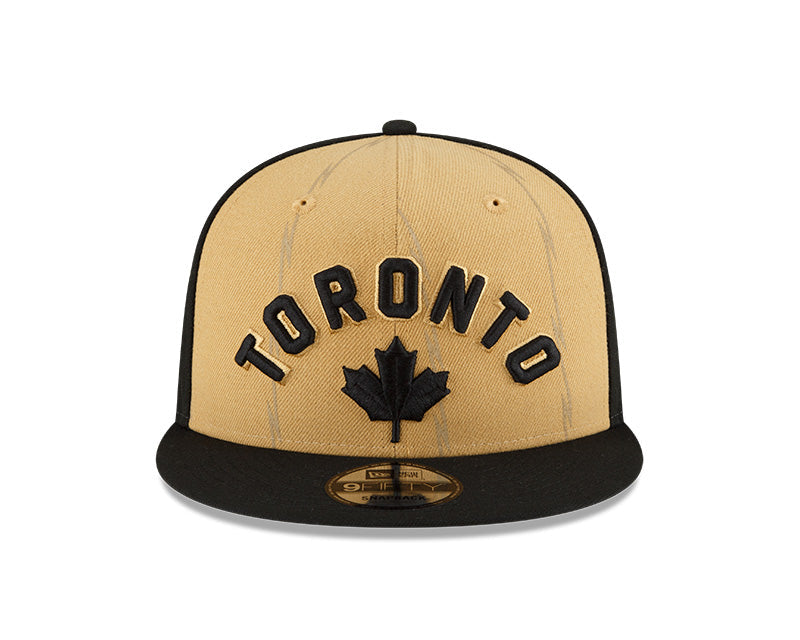 New Era Tan/Black Toronto Raptors 2023/24 City Edition Official 9FIFTY Snapback Hat