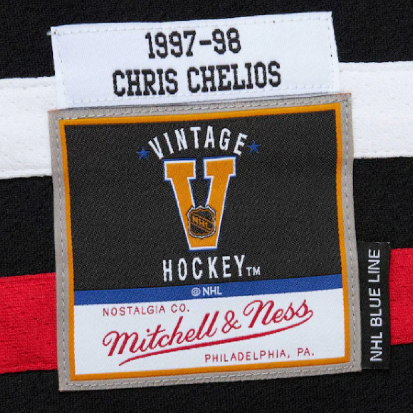 Mitchell & Ness NHL Chris Chelios Chicago Blackhawks 1997/98 Captain Replica Jersey - Black/Red