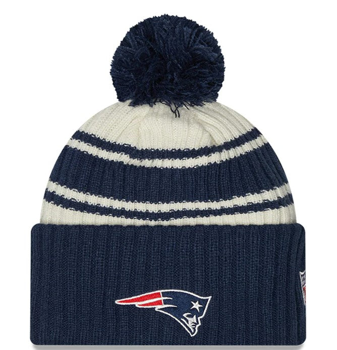 New Era Cream/Navy New England Patriots 2022 Sideline Sport Cuffed Pom Knit Hat