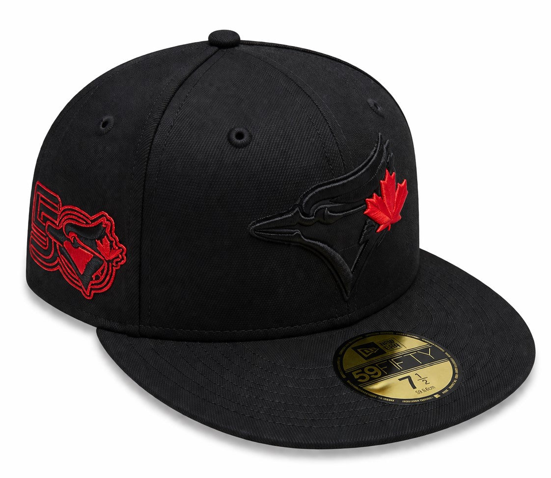 Black cap with red and gold accents featuring a logo and a maple leaf on a white background
